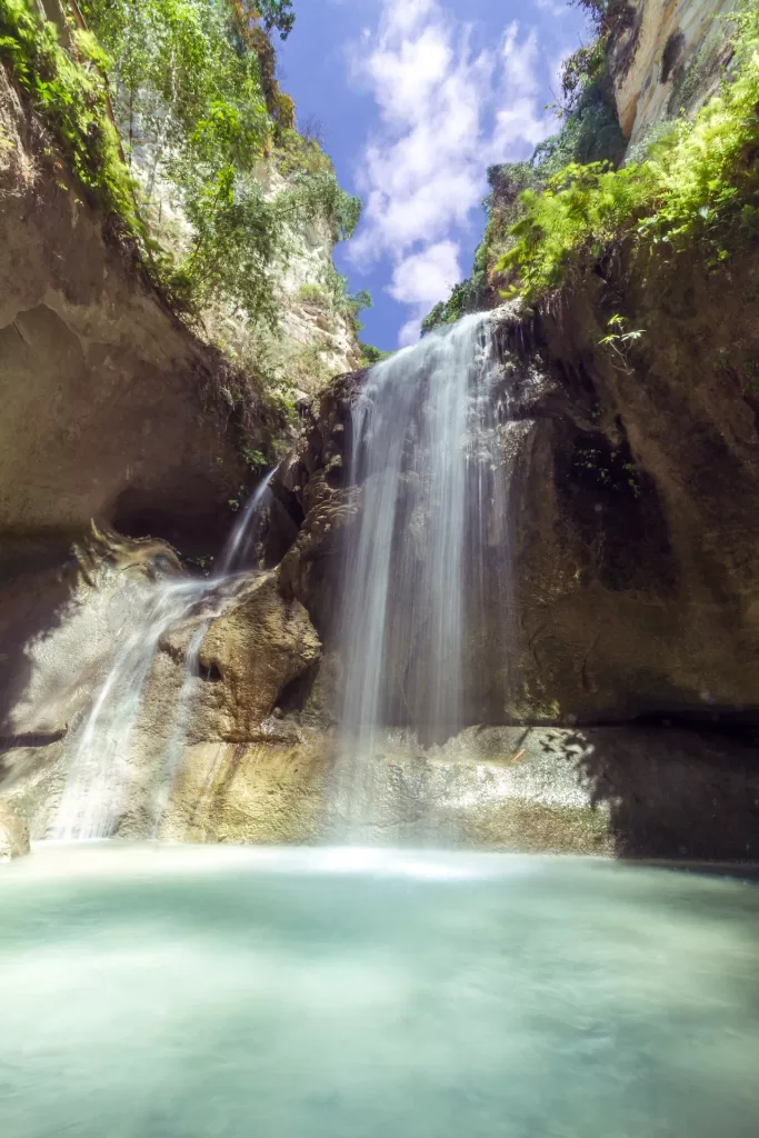 Majestic Escondido Falls waterfall cascading into a pool below