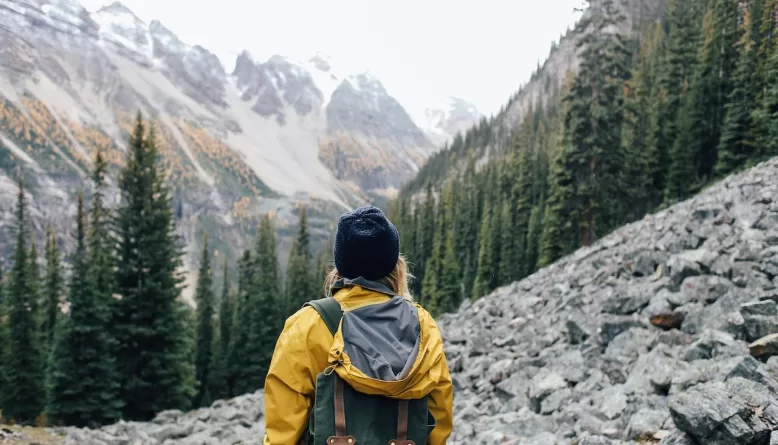 Photo by Rachel Claire: https://www.pexels.com/photo/traveler-standing-on-stones-in-mountainous-terrain-4993107/ with hiking clothes